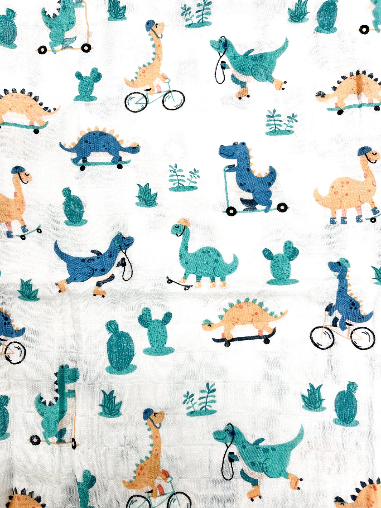Couverture mousseline de bambou - Dinosaures trottinette et skateboard