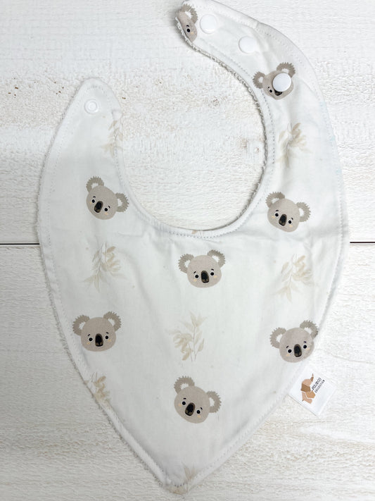Bavoir - Koalas et feuillus beige (Tache d'encre bleu)