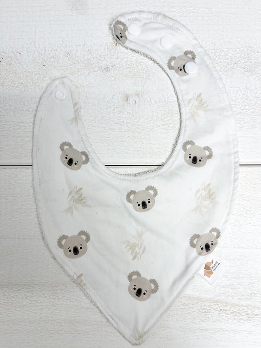 Bavoir - Koalas et feuillus beige (Tache d'encre rouge)